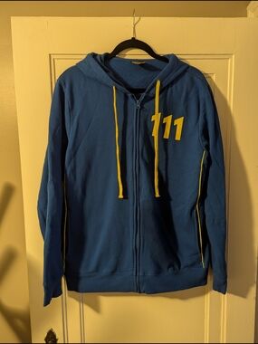 Fallout Vault 111 Blue Zip-Up Hooded Sweater with Yellow Accents